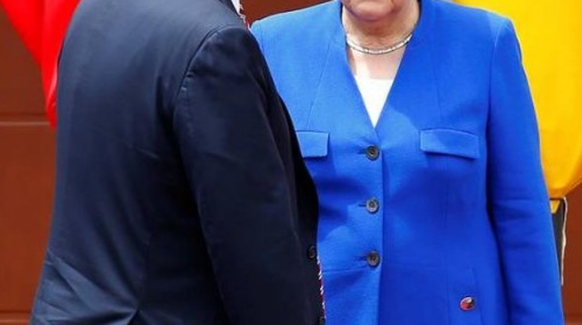 דונלד טראמפ ואנגלה מרקל (צילום: רויטרס)