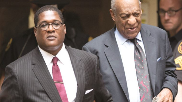 ביל קוסבי ופרקליטו (צילום: AFP)