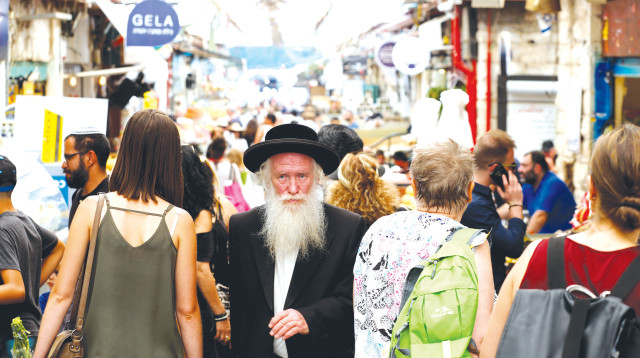 חרדים וחילונים (צילום: רויטרס)