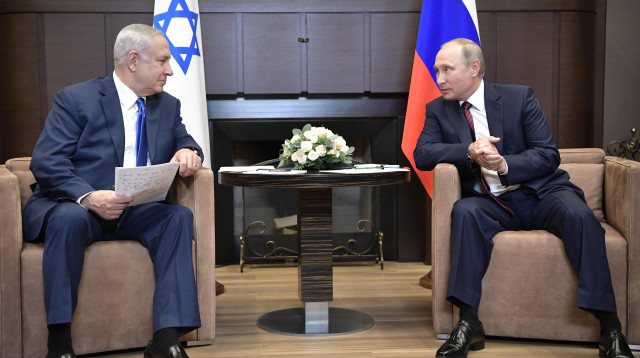 ראש הממשלה בנימין נתניהו עם נשיא רוסיה ולדימיר פוטין (צילום: AFP)