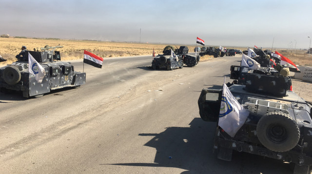 כוחות עיראקיים סמוך לכירכוכ (צילום: רויטרס)