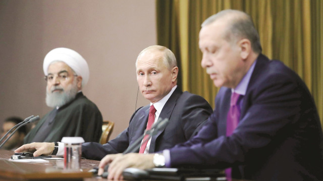 ארדואן, ולדימיר פוטין וחסן רוחאני (צילום: רויטרס)