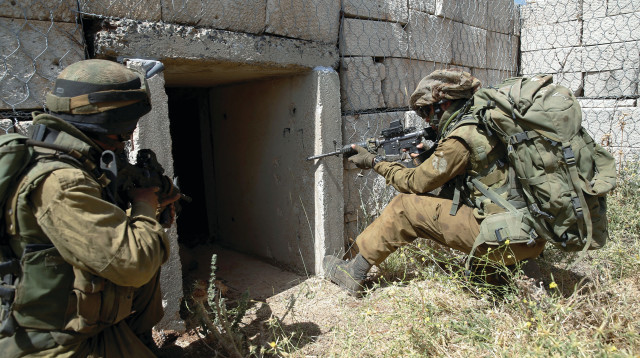 חיילי צה"ל באימון בצפון (צילום: רויטרס)