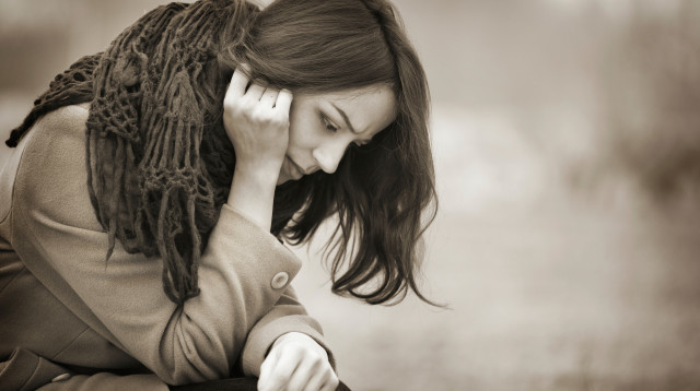 אישה עצובה, אילוסטרציה (צילום: אינג אימג')