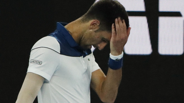 נובאק דג'וקוביץ' מודח מאוסטרליה (צילום: רויטרס)