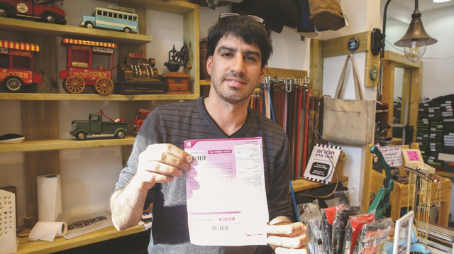 קיבל דוח במתחם ביג באשדוד (צילום: לירון מולדובן)