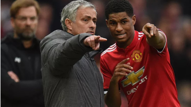 ז'וזה מוריניו עם מרכוס ראשפורד (צילום: AFP)