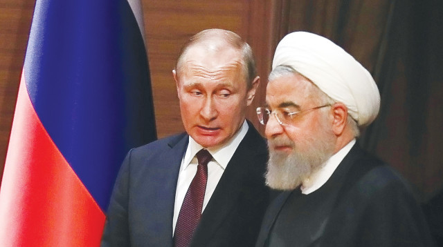 עלי חמינאי וולדימיר פוטין (צילום: AFP)