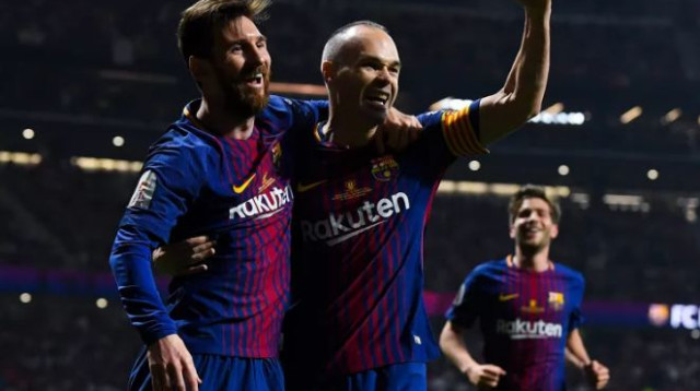 אינייסטה עם מסי (צילום: Getty images)