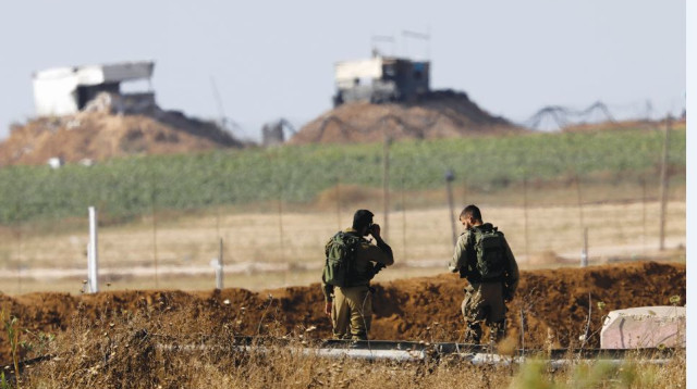 כוח צה"ל בגבול הרצועה (צילום: רויטרס)