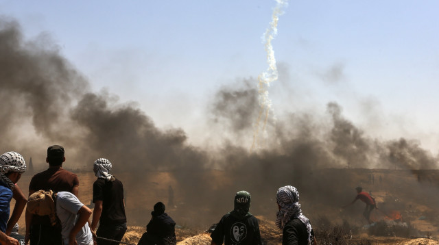 מהומות בגבול רצועת עזה (צילום: עבד רחים כתיב, פלאש 90)