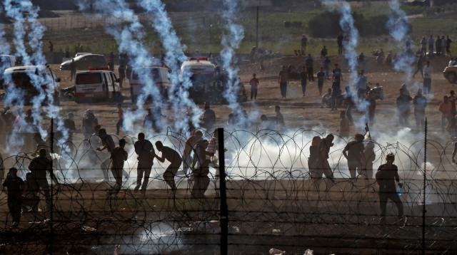 מהומות בגבול רצועת עזה (צילום: AFP)