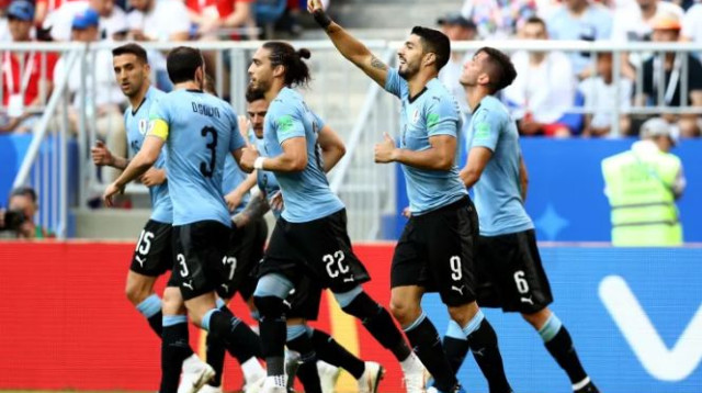 לואיס סוארס חוגג (צילום: AFP)