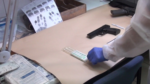 דגימות הדי אן איי (צילום: דוברות המשטרה)