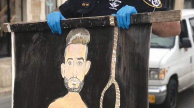 התמונה שנתלתה ביפו (צילום: משטרת ישראל)