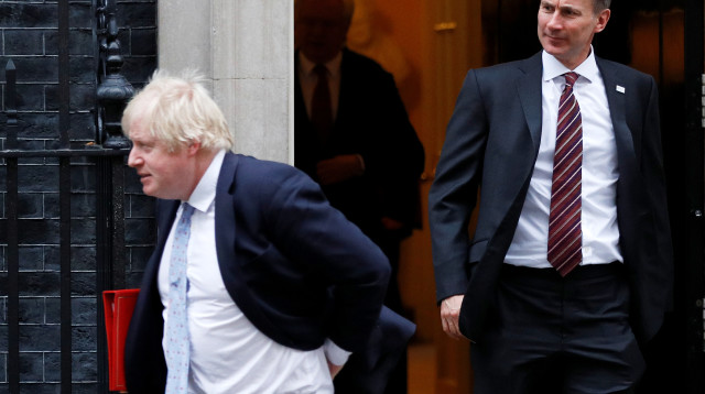 ג'רמי האנט ובוריס ג'ונסון (צילום: רויטרס)