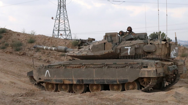 טנק של צה"ל בגבול רצועת עזה (צילום: AFP)