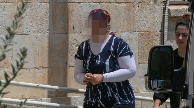 האם החשודה בהזרקת אינסולין לבנה (צילום: יונתן זינדל, פלאש 90)