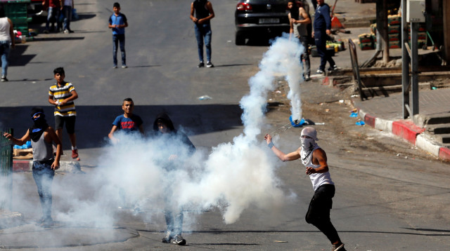 עימותים עם פלסטינים ברשות (צילום: רויטרס)