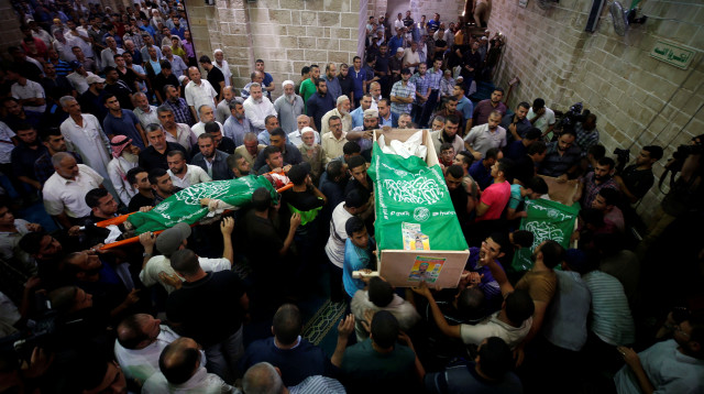 הלוויה של פעילי חמאס בעזה (צילום: רויטרס)