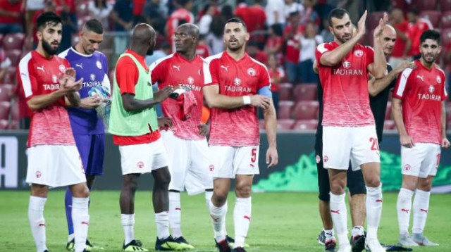 שחקני הפועל באר שבע (צילום: דני מרון)