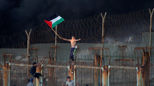 עימותים בגבול רצועת עזה (צילום: רויטרס)