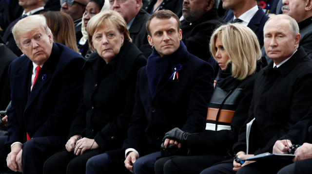 דונלד טראמפ, אנגלה מרקל, עמנואל מקרון, בריז'יט מקרון, ולדימיר פוטין (צילום: רויטרס)