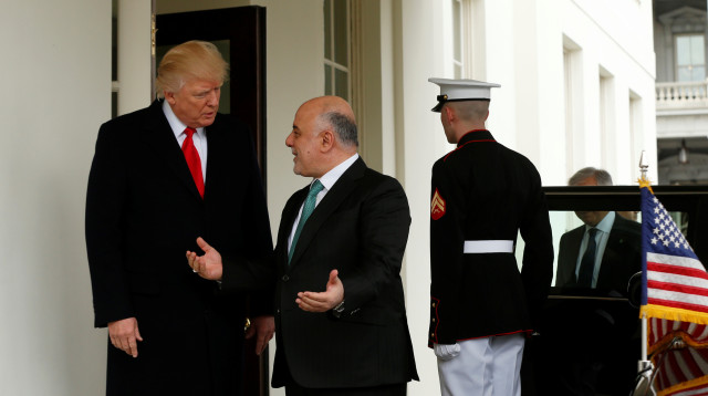 דונלד טראמפ עם ראש ממשלת עיראק חיידר אל-עבאדי, מרץ 2017 (צילום: רויטרס)