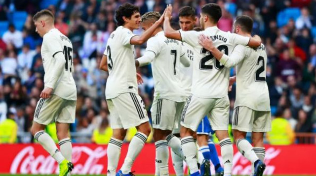 שחקני ריאל מדריד חוגגים נגד מלייה (צילום: Getty images)