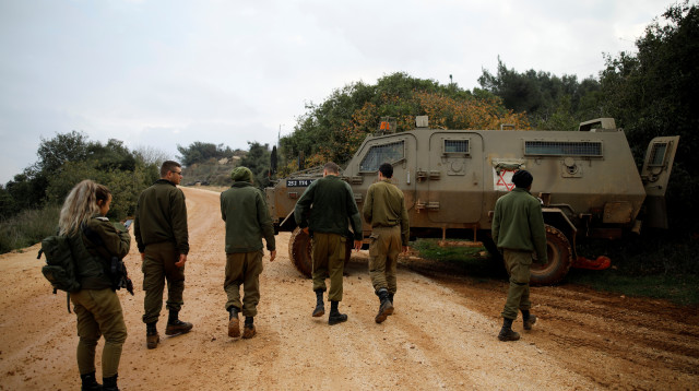 חיילי צה"ל בגבול לבנון במהלך מבצע "מגן צפוני" (צילום: רויטרס)