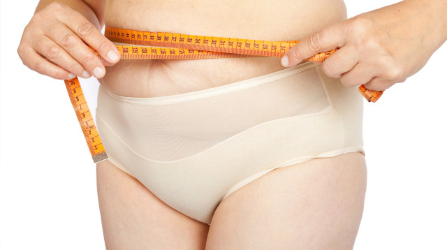 אישה בדיאטה (צילום: אינג אימג')