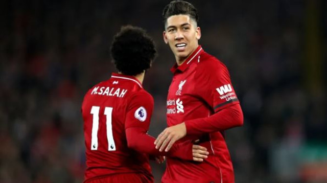 רוברטו פירמינו ומוחמד סלאח חוגגים (צילום: Getty images)