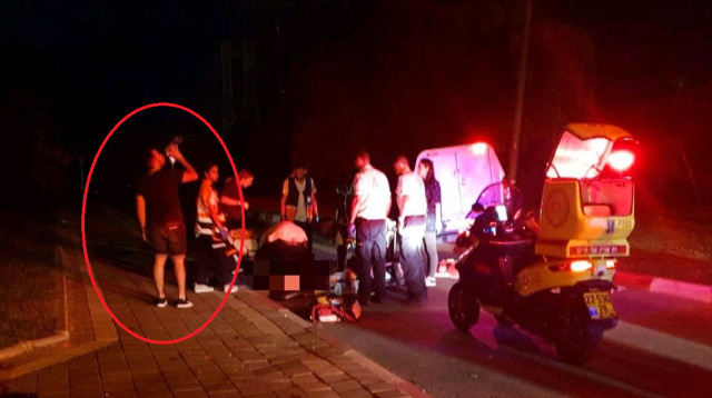 אלי בר זכאי שותה מים בזירת התאונה (צילום: תיעוד מבצעי מד"א)