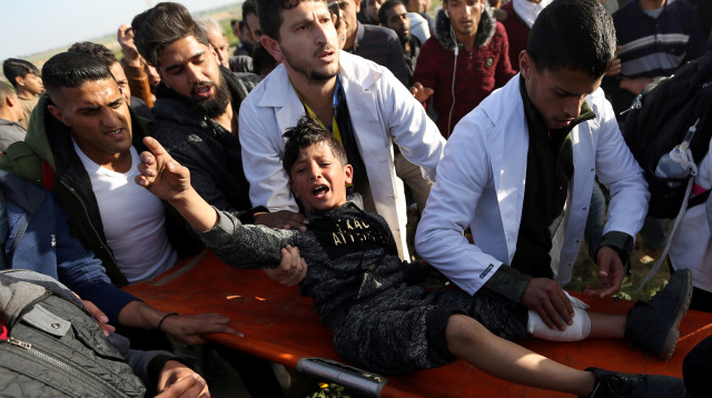 ילד פלסטיני שנמצא בעימותים ברצועה (צילום: רויטרס)