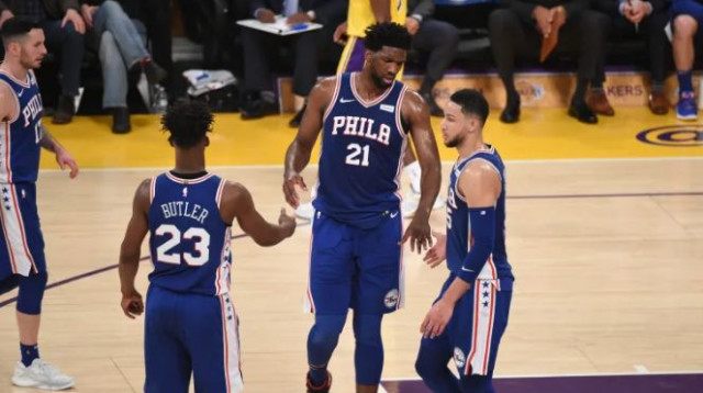 ג'ואל אמביד, ג'ימי באטלר, בן סימונס (צילום: AFP)