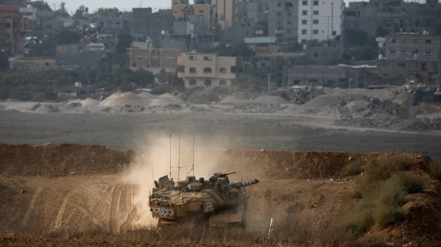 טנק של צה"ל בגבול רצועת עזה (צילום: רויטרס)