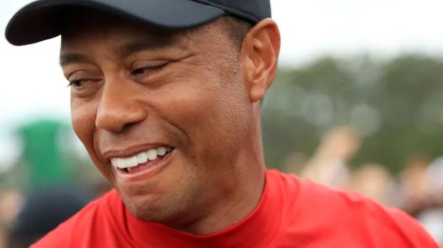 טראמפ, אובמה ובריידי: אמריקה מתרגשת מהזכייה של טייגר וודס  (צילום: AFP)