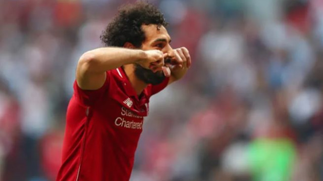 מוחמד סלאח חוגג בגמר ליגת האלופות (צילום: Getty images)