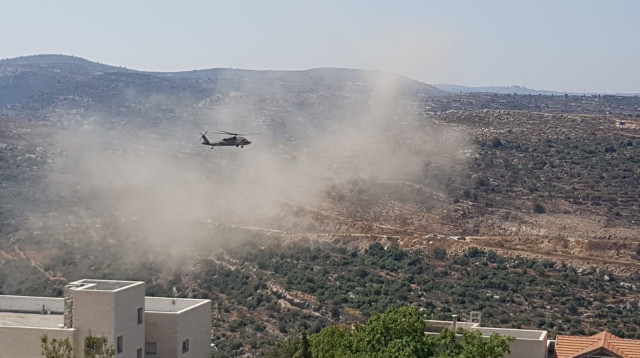 מסוק צבאי מפנה את הפצועים בדולב (צילום: דוברות דולב)