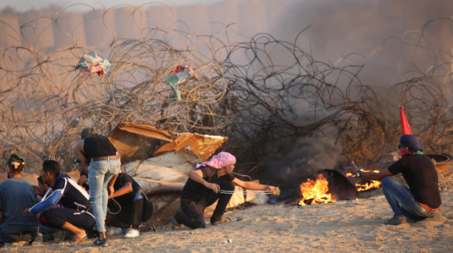 עימותים בגבול רצועת עזה (צילום: חסן ג'די, פלאש 90)