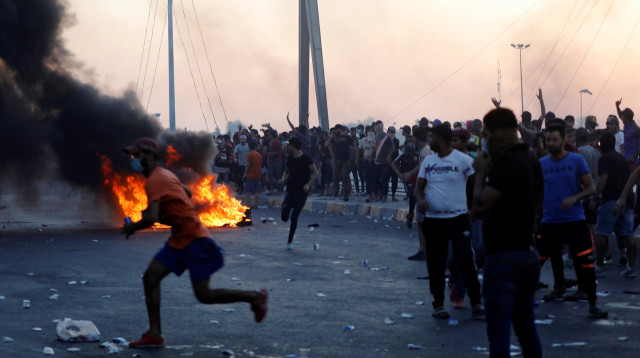 ההפגנות האלימות בעיראק (צילום: רויטרס)