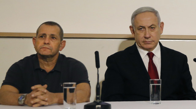 בנימין נתניהו, נדב ארגמן (צילום: GIL COHEN-MAGEN / AFP)