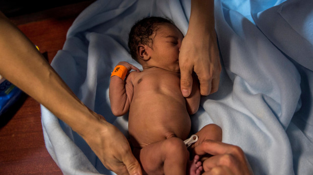 תינוק (צילום: OLMO CALVO/Getty images)
