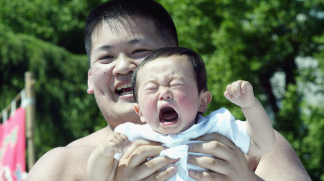 תינוק בוכה  (צילום: Koichi Kamoshida/Getty images)