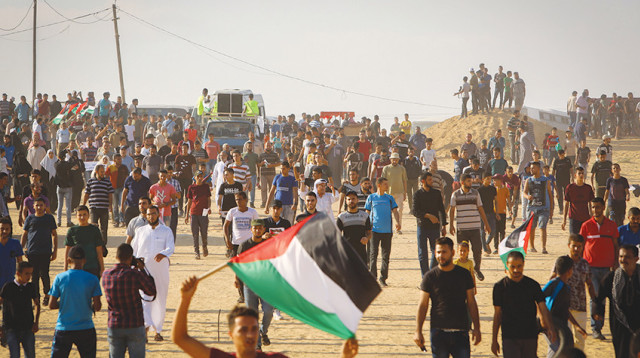 ההפגנות על הגדר (צילום: עאבד רחים קטיב)