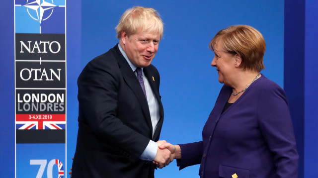 אנגלה מרקל, בוריס ג'ונסון (צילום: רויטרס)