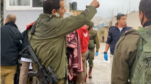 זירת הפיגוע בקרית ארבע (צילום: דובר צה"ל)