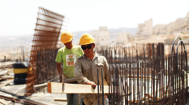 פועלים אסיאתיים (צילום: קובי גדעון, פלאש 90)