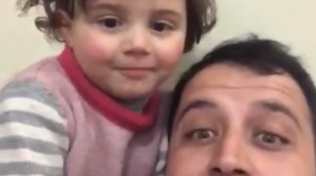 אבא ובת, סוריה (צילום: רויטרס)