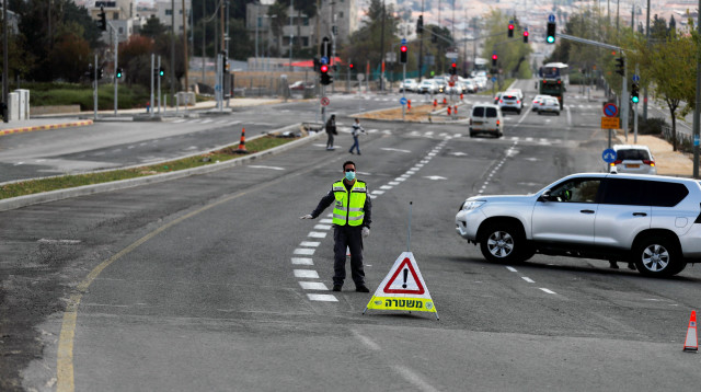 אכיפת הסגר בישראל (צילום: REUTERS/Ammar Awad)